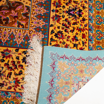 Spot silk rug in 350x250 cms featuring turquoise and mustard floral designs with a detailed medallion and golden border work.