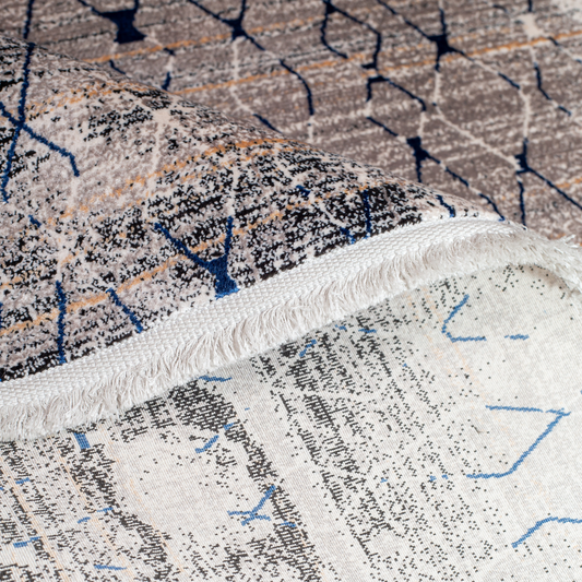 Stark cotton Rug in 200x300 cms with a distressed ivory base, taupe texture, and navy geometric lattice design, perfect for contemporary living spaces.