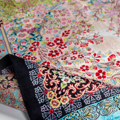 Tapin Silk Rug featuring nature-inspired artwork with birds, flowers, and flowing water on an ivory base with turquoise and black borders, 150x100 cm.