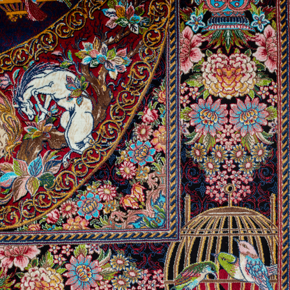 Terra silk rug with navy base, multi-colour birdcage motifs, floral accents, and detailed animal and garden scenes in 150x100 cm size.
