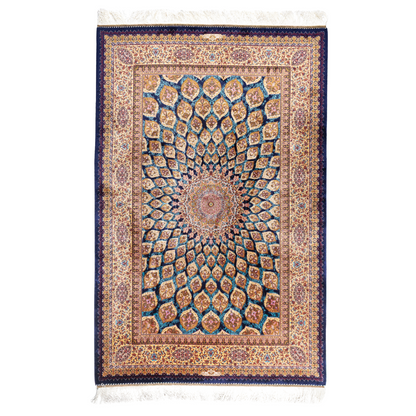 Tobe silk rug featuring a medallion and floral design in navy, ruby, teal, and ivory. Size: 150x100 cms.
