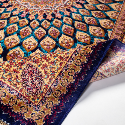 Tobe silk rug featuring a medallion and floral design in navy, ruby, teal, and ivory. Size: 150x100 cms.