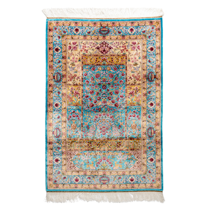 Tolly Silk Rug featuring ruby red floral and bird motifs on an aqua-blue base with golden ornate panels, size 150x100 cm.