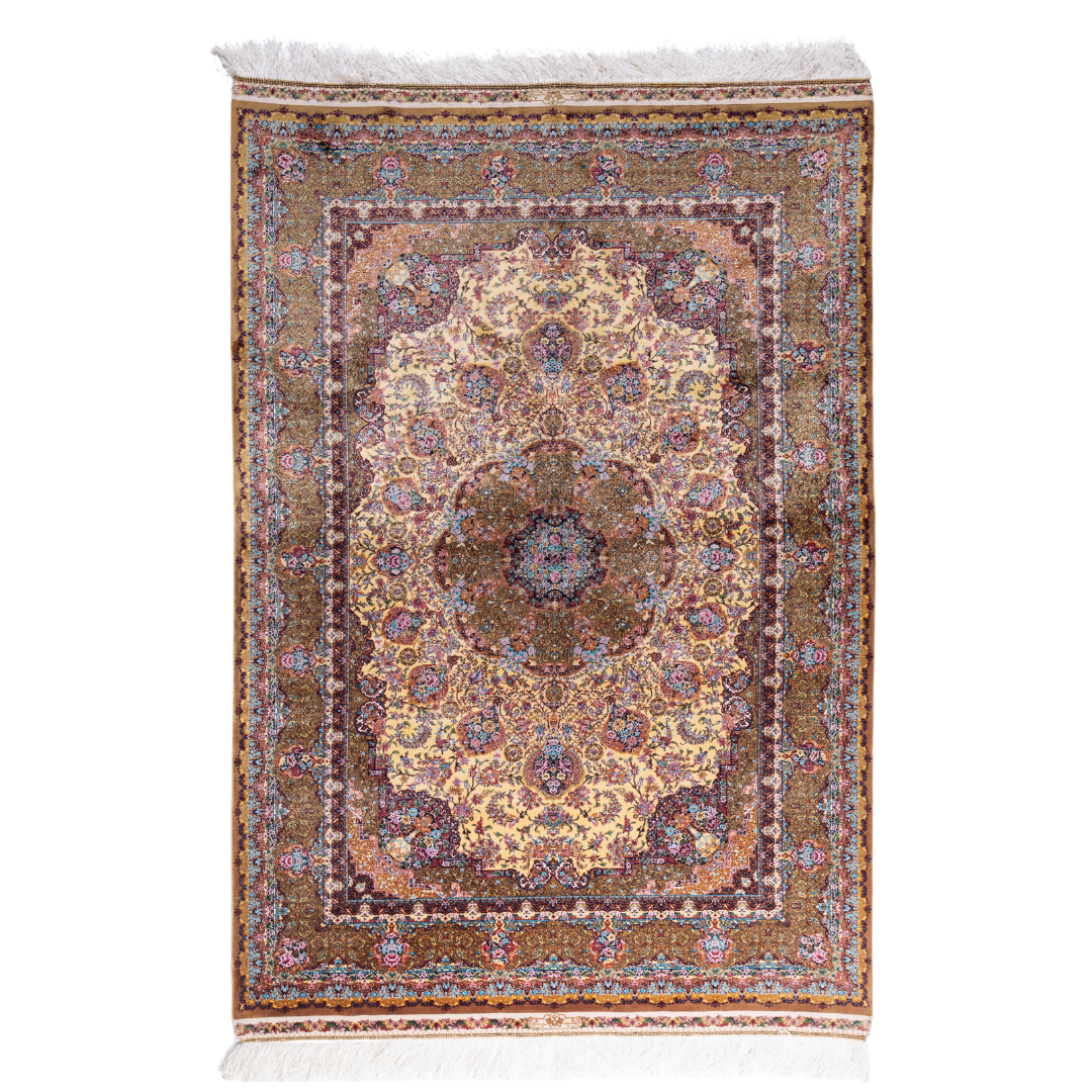 Golden silk rug with floral medallion center and wine-toned border, featuring intricate handmade detailing and vibrant color accents.

