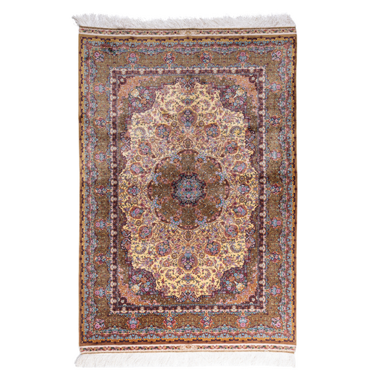 Golden silk rug with floral medallion center and wine-toned border, featuring intricate handmade detailing and vibrant color accents.

