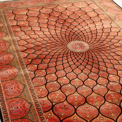 Detailed view of the Val silk rug in 200x300 cms featuring a red medallion pattern with floral motifs and intricate border work.