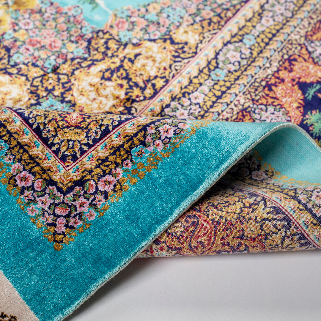 Turquoise silk rug with intricate horses and floral border details, handcrafted in fine silk.
