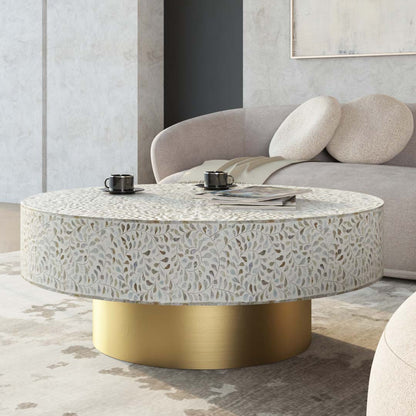 Round white mother of pearl inlay coffee table with floral design and a gold cylindrical base. Available in 3 size variants.
