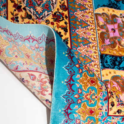 Luxurious 200x300 cm silk rug featuring a radiant blue and gold medallion design with intricate floral and geometric detailing.