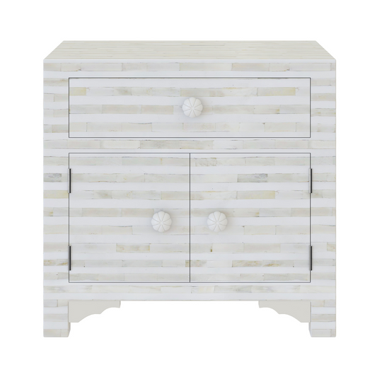 The lume Side Drawer features white bone inlay with cabinet doors and a drawer. A graceful accent for luxury interiors.

