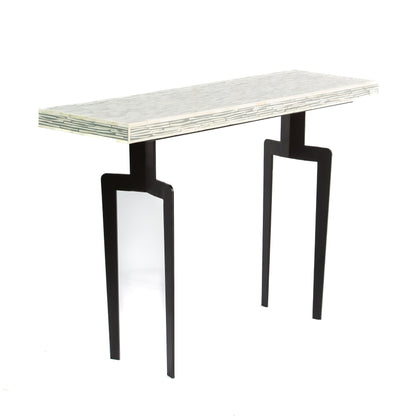Table with bone inlay top and black legs 