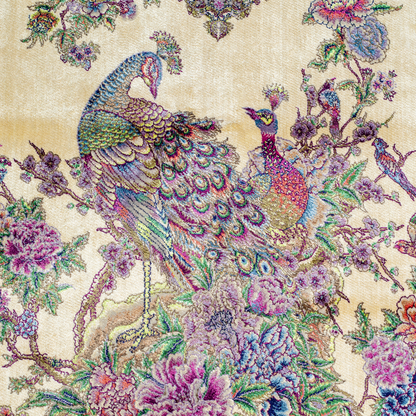 Luxurious ivory silk rug featuring peacocks, floral motifs, and intricate detailing, handcrafted with multicolored threads.